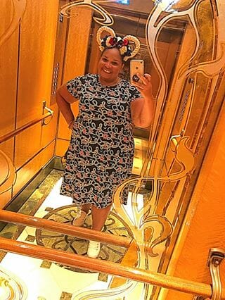 Aurora Elizabeth McBride- “On a cruise for my best friend’s wedding this past May! I hate my teeth 1009999990 percent so I hardly smile open-mouthed, but I love this dress and my ears so much I couldn’t help it! I am so grateful for my support system, namely my mother who taught me, “Never let the dark thoughts move in. It’s OK to let them visit, but don’t let them unpack.” - Curvicality magazine