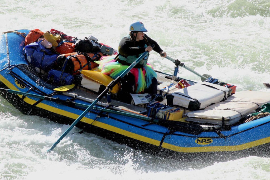 plus-size white water rafting guide
